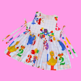 Puppet Street Apron Dress (L-XL)